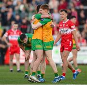 20 April 2024; Daire O Baoill, left, and Ciaran Moore of Donegal celebrate after the Ulster GAA Football Senior Championship quarter-final match between Derry and Donegal at Celtic Park in Derry. Photo by Stephen McCarthy/Sportsfile