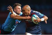 20 April 2024; Simon Zebo of Munster is tackled by David Kriel of Vodacom Bulls during the United Rugby Championship match between Vodacom Bulls and Munster at Loftus Versfeld Stadium in Pretoria, South Africa. Photo by Shaun Roy/Sportsfile