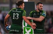 20 April 2024; Tom Farrell of Connacht, left, celebrates with  team-mate Andrew Smith after scoring his side's fourth try  during the United Rugby Championship match between Connacht and Zebre Parma at Dexcom Stadium in Galway. Photo by Sam Barnes/Sportsfile