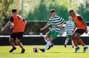 20 April 2024; Cian Punch of Pike Rovers in action against Luke Bolton, left, and Adetunji Olusaya of St Kevin’s FC during the FAI Youth Cup final match between St Kevin’s FC, DDSL, and Pike Rovers, Limerick District League at Home Farm FC in Dublin. Photo by Michael P Ryan/Sportsfile