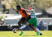 20 April 2024; Idris Olafimihan of St Kevin’s FC in action against Keelan Corbett of Pike Rovers during the FAI Youth Cup final match between St Kevin’s FC, DDSL, and Pike Rovers, Limerick District League at Home Farm FC in Dublin. Photo by Michael P Ryan/Sportsfile
