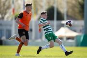 20 April 2024; Ethan Joyce of Pike Rovers in action against Ilya Bednakovs of St Kevin’s FC during the FAI Youth Cup final match between St Kevin’s FC, DDSL, and Pike Rovers, Limerick District League at Home Farm FC in Dublin. Photo by Michael P Ryan/Sportsfile