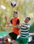 20 April 2024; Evan McGee of St Kevin’s FC in action against Keelan Corbett of Pike Rovers during the FAI Youth Cup final match between St Kevin’s FC, DDSL, and Pike Rovers, Limerick District League at Home Farm FC in Dublin. Photo by Michael P Ryan/Sportsfile