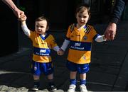 21 April 2024; Eighteen month old Seán Faron and three year old Ruairí from Kilfilun in Clare, with their dad and grandad, before the Munster GAA Hurling Senior Championship Round 1 match between Clare and Limerick at Cusack Park in Ennis, Clare. Photo by Ray McManus/Sportsfile