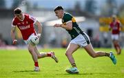20 April 2024; Sean O'Shea of Kerry in action against Daniel O'Mahony of Cork during the Munster GAA Football Senior Championship semi-final match between Kerry and Cork at Fitzgerald Stadium in Killarney, Kerry. Photo by Brendan Moran/Sportsfile