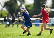 21 April 2024; Ciara Connolly of Wicklow in action against Orlaith McElduff of Tyrone during the Electric Ireland All-Ireland Camogie Minor C semi-final match between Tyrone and Wicklow at Dunganny in Meath. Photo by Sam Barnes/Sportsfile