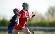 21 April 2024; Tyrone goalkeeper Sienna Gildernew in action against Ciara Lambe of Wicklow during the Electric Ireland All-Ireland Camogie Minor C semi-final match between Tyrone and Wicklow at Dunganny in Meath. Photo by Sam Barnes/Sportsfile