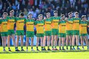 20 April 2024; Donegal players stand for the playing of the National Anthem before the Ulster GAA Football Senior Championship quarter-final match between Derry and Donegal at Celtic Park in Derry. Photo by Stephen McCarthy/Sportsfile