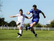 21 April 2024; Michael Brennan of Waterford & District Junior Football League in action against Cillian McGlade of Mayo Football League during the FAI Oscar Traynor Inter-League Cup final match between Mayo Football League and Waterford & District Junior League at Umbro Park, Milebush, Castlebar in Mayo. Photo by Michael P Ryan/Sportsfile