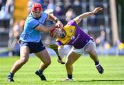 21 April 2024; Lee Chin of Wexford in action against Paddy Smyth of Dublin during the Leinster GAA Hurling Senior Championship Round 1 match between Wexford and Dublin at Chadwicks Wexford Park in Wexford. Photo by Tyler Miller/Sportsfile