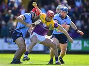 21 April 2024; Lee Chin of Wexford in action against Paddy Smyth, left, and John Bellew of Dublin during the Leinster GAA Hurling Senior Championship Round 1 match between Wexford and Dublin at Chadwicks Wexford Park in Wexford. Photo by Tyler Miller/Sportsfile