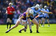 21 April 2024; Rory O'Connor of Wexford in action against Conor Donohoe of Dublin during the Leinster GAA Hurling Senior Championship Round 1 match between Wexford and Dublin at Chadwicks Wexford Park in Wexford. Photo by Tyler Miller/Sportsfile