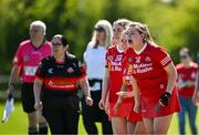 21 April 2024; Tyrone substitutes, including Hollie Croucher, 16, encourage their team during the Electric Ireland All-Ireland Camogie Minor C semi-final match between Tyrone and Wicklow at Dunganny in Meath. Photo by Sam Barnes/Sportsfile