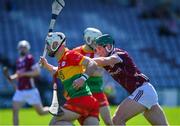 21 April 2024; Chris Nolan of Carlow in action against Gavin Lee of Galway during the Leinster GAA Hurling Senior Championship Round 1 match between Galway and Carlow at Pearse Stadium in Galway. Photo by Ray Ryan/Sportsfile