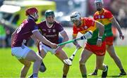21 April 2024; Chris Nolan of Carlow in action against Ronan Glennon and Gavin Lee of Galway during the Leinster GAA Hurling Senior Championship Round 1 match between Galway and Carlow at Pearse Stadium in Galway. Photo by Ray Ryan/Sportsfile