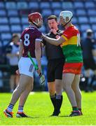 21 April 2024; Referee Sean Stack intervenes with Ronan Glennon of Galway and Fiachra Fitzpatrick of Carlow during the Leinster GAA Hurling Senior Championship Round 1 match between Galway and Carlow at Pearse Stadium in Galway. Photo by Ray Ryan/Sportsfile