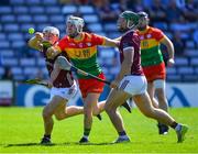 21 April 2024; Daithí Burke of Galway in action against Chris Nolan of Carlow during the Leinster GAA Hurling Senior Championship Round 1 match between Galway and Carlow at Pearse Stadium in Galway. Photo by Ray Ryan/Sportsfile