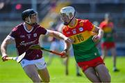 21 April 2024; Fiachra Fitzpatrick of Carlow in action against Seán Linnane of Galway during the Leinster GAA Hurling Senior Championship Round 1 match between Galway and Carlow at Pearse Stadium in Galway. Photo by Ray Ryan/Sportsfile