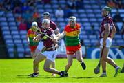 21 April 2024; Daithí Burke of Galway in action against Chris Nolan of Carlow during the Leinster GAA Hurling Senior Championship Round 1 match between Galway and Carlow at Pearse Stadium in Galway. Photo by Ray Ryan/Sportsfile