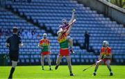 21 April 2024; Conor Cooney of Galway in action against Fiachra Fitzpatrick of Carlow during the Leinster GAA Hurling Senior Championship Round 1 match between Galway and Carlow at Pearse Stadium in Galway. Photo by Ray Ryan/Sportsfile
