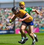 21 April 2024; Cathal Malone of Clare is tackled by Tom Morrissey of Limerick during the Munster GAA Hurling Senior Championship Round 1 match between Clare and Limerick at Cusack Park in Ennis, Clare. Photo by Ray McManus/Sportsfile
