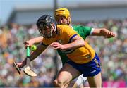 21 April 2024; Cathal Malone of Clare is tackled by Tom Morrissey of Limerick during the Munster GAA Hurling Senior Championship Round 1 match between Clare and Limerick at Cusack Park in Ennis, Clare. Photo by Ray McManus/Sportsfile