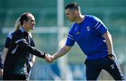 21 April 2024; Referee David Coldrick, left, and Cavan manager Raymond Galligan shake hands before the Ulster GAA Football Senior Championship quarter-final match between Cavan and Tyrone at Kingspan Breffni in Cavan. Photo by Seb Daly/Sportsfile