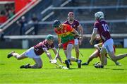21 April 2024; Richard Coady of Carlow in action against Ronan Glennon and Donal O’Shea of Galway during the Leinster GAA Hurling Senior Championship Round 1 match between Galway and Carlow at Pearse Stadium in Galway. Photo by Ray Ryan/Sportsfile