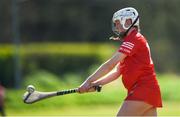 21 April 2024; Orlaith Cremin of Cork scores a point during the Electric Ireland All-Ireland Camogie Minor A semi-final match between Cork and Waterford at Kilcommon in Tipperary. Photo by Tom Beary/Sportsfile