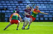 21 April 2024; Declan Mc Loughlin of Galway in action against Paul Doyle and Niall Bolger of Carlow during the Leinster GAA Hurling Senior Championship Round 1 match between Galway and Carlow at Pearse Stadium in Galway. Photo by Ray Ryan/Sportsfile