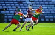 21 April 2024; Declan Mc Loughlin of Galway in action against Paul Doyle and Niall Bolger of Carlow during the Leinster GAA Hurling Senior Championship Round 1 match between Galway and Carlow at Pearse Stadium in Galway. Photo by Ray Ryan/Sportsfile