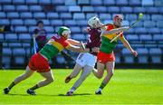 21 April 2024; Declan Mc Loughlin of Galway in action against Paul Doyle and Niall Bolger of Carlow during the Leinster GAA Hurling Senior Championship Round 1 match between Galway and Carlow at Pearse Stadium in Galway. Photo by Ray Ryan/Sportsfile