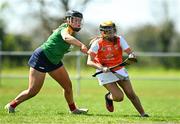 21 April 2024; Ríonagh Lenaghan of Armagh in action against India Mernagh of Carlow during the Electric Ireland All-Ireland Camogie Minor B semi-final match between Armagh and Carlow at Dunganny in Meath. Photo by Sam Barnes/Sportsfile