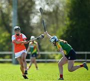 21 April 2024; Eimear McGeary of Armagh in action against Clodagh Lawler of Carlow during the Electric Ireland All-Ireland Camogie Minor B semi-final match between Armagh and Carlow at Dunganny in Meath. Photo by Sam Barnes/Sportsfile