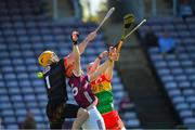 21 April 2024; Conor Whelan of Galway in action against Carlow goalkeeper Brian Tracey and Dion Wall of Carlow during the Leinster GAA Hurling Senior Championship Round 1 match between Galway and Carlow at Pearse Stadium in Galway. Photo by Ray Ryan/Sportsfile