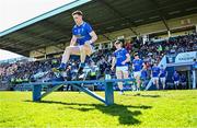 21 April 2024; Ciarán Brady of Cavan leads his side out for the team photograph before the Ulster GAA Football Senior Championship quarter-final match between Cavan and Tyrone at Kingspan Breffni in Cavan. Photo by Seb Daly/Sportsfile