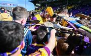21 April 2024; Simon Donohoe of Wexford signs autographs after the Leinster GAA Hurling Senior Championship Round 1 match between Wexford and Dublin at Chadwicks Wexford Park in Wexford. Photo by Tyler Miller/Sportsfile