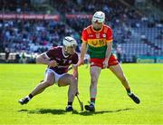 21 April 2024; Daithí Burke of Galway in action against Martin Kavanagh of Carlow during the Leinster GAA Hurling Senior Championship Round 1 match between Galway and Carlow at Pearse Stadium in Galway. Photo by Ray Ryan/Sportsfile