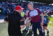 21 April 2024; Carlow manager Tom Mullally shakes hands with Galway manager Henry Shefflin after the game in the Leinster GAA Hurling Senior Championship Round 1 match between Galway and Carlow at Pearse Stadium in Galway. Photo by Ray Ryan/Sportsfile