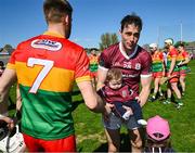 21 April 2024; Conor Cooney of Galway holds on to 7 month old Evan Healy for a picture after the Leinster GAA Hurling Senior Championship Round 1 match between Galway and Carlow at Pearse Stadium in Galway. Photo by Ray Ryan/Sportsfile