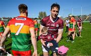 21 April 2024; Conor Cooney of Galway holds on to 7 month old Evan Healy for a picture after the Leinster GAA Hurling Senior Championship Round 1 match between Galway and Carlow at Pearse Stadium in Galway. Photo by Ray Ryan/Sportsfile