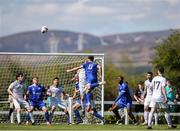 21 April 2024; Michael Brennan of Waterford & District Junior Football League has a header on goal during the FAI Oscar Traynor Inter-League Cup final match between Mayo Football League and Waterford & District Junior League at Umbro Park, Milebush, Castlebar in Mayo. Photo by Michael P Ryan/Sportsfile