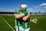 21 April 2024; Limerick players, from left, Diarmaid Byrnes and Cian Linch celebrate after the Munster GAA Hurling Senior Championship Round 1 match between Clare and Limerick at Cusack Park in Ennis, Clare. Photo by Ray McManus/Sportsfile