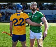 21 April 2024; Shane O'Donnell of Clare and Cian Lynch of Limerick after the Munster GAA Hurling Senior Championship Round 1 match between Clare and Limerick at Cusack Park in Ennis, Clare. Photo by Ray McManus/Sportsfile