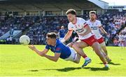 21 April 2024; Cian Madden of Cavan in action against Michael McKernan of Tyrone during the Ulster GAA Football Senior Championship quarter-final match between Cavan and Tyrone at Kingspan Breffni in Cavan. Photo by Seb Daly/Sportsfile