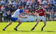 21 April 2024; Conor Lehane of Cork is tackled by Tadhg de Burca of Waterford during the Munster GAA Hurling Senior Championship Round 1 match between Waterford and Cork at Walsh Park in Waterford. Photo by Brendan Moran/Sportsfile