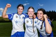 21 April 2024; Waterford players, from left, Maggie Gostl, Alex Healy and Aoife Connelly of Waterford celebrate after the Electric Ireland All-Ireland Camogie Minor A semi-final match between Cork and Waterford at Kilcommon in Tipperary. Photo by Tom Beary/Sportsfile