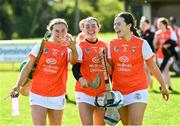 21 April 2024; Armagh players from left, Molly Short, Sarah Connolly and Caoimhe Farrell celebrate after their side's victory in the Electric Ireland All-Ireland Camogie Minor B semi-final match between Armagh and Carlow at Dunganny in Meath. Photo by Sam Barnes/Sportsfile