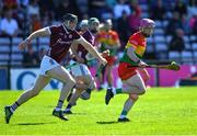 21 April 2024; Dion Wall of Carlow in action against John Cooney of Galway during the Leinster GAA Hurling Senior Championship Round 1 match between Galway and Carlow at Pearse Stadium in Galway. Photo by Ray Ryan/Sportsfile