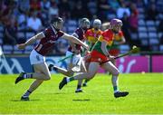 21 April 2024; Dion Wall of Carlow in action against John Cooney of Galway during the Leinster GAA Hurling Senior Championship Round 1 match between Galway and Carlow at Pearse Stadium in Galway. Photo by Ray Ryan/Sportsfile